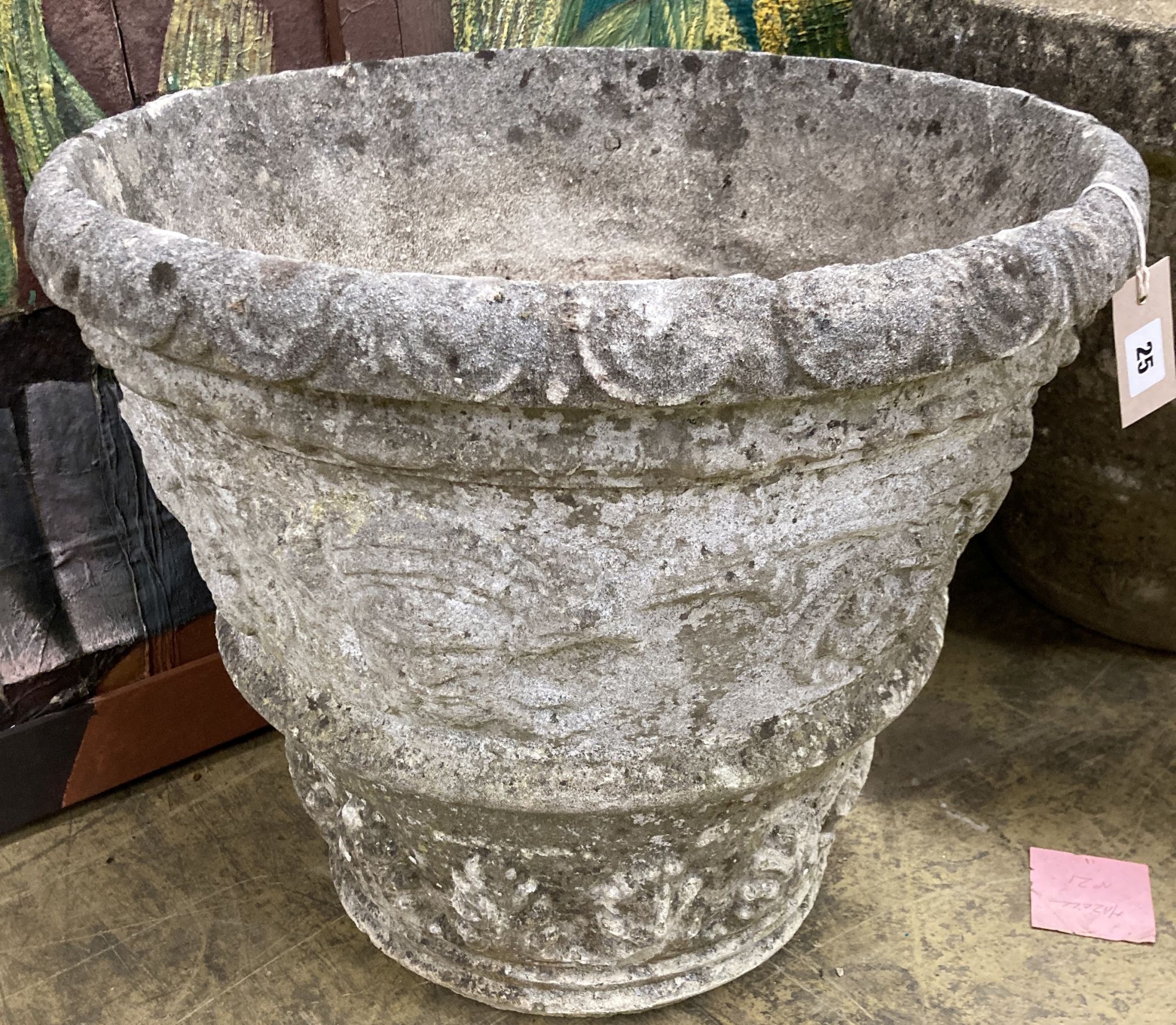 A pair of reconstituted stone circular garden urns, diameter 55cm, height 48cm